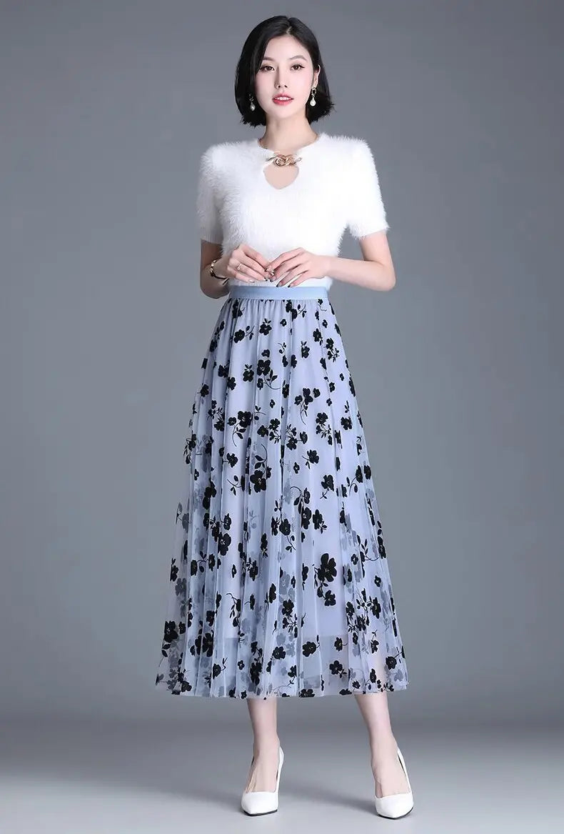 Virágos rakott midiszoknya A