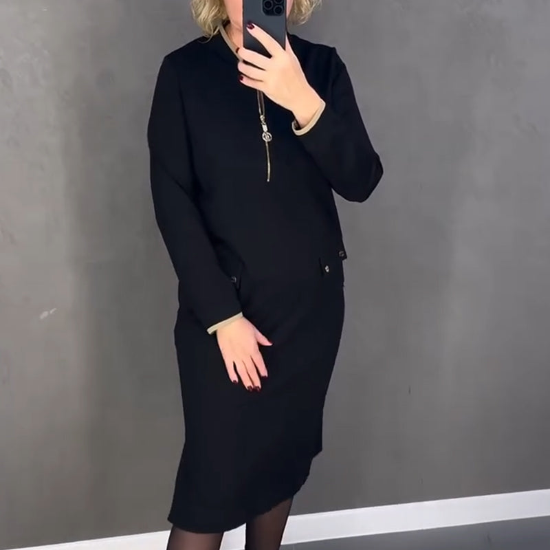 Elegáns fekete női ruha hosszú ujjal