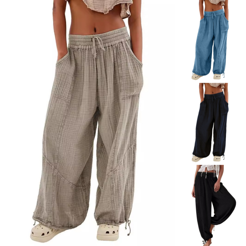 Női lezser, rugalmas, széles szárú nadrág zsebekkel