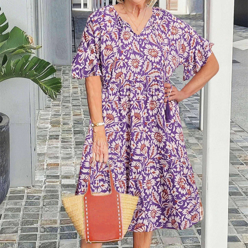 V-nyakú nyomtatott midi ruha