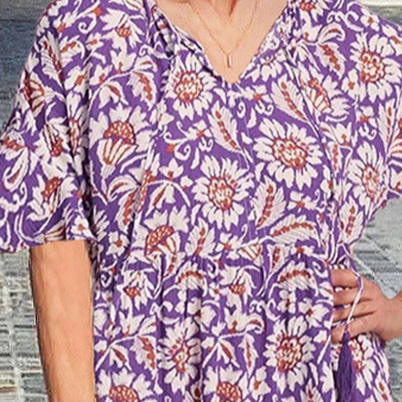 V-nyakú nyomtatott midi ruha