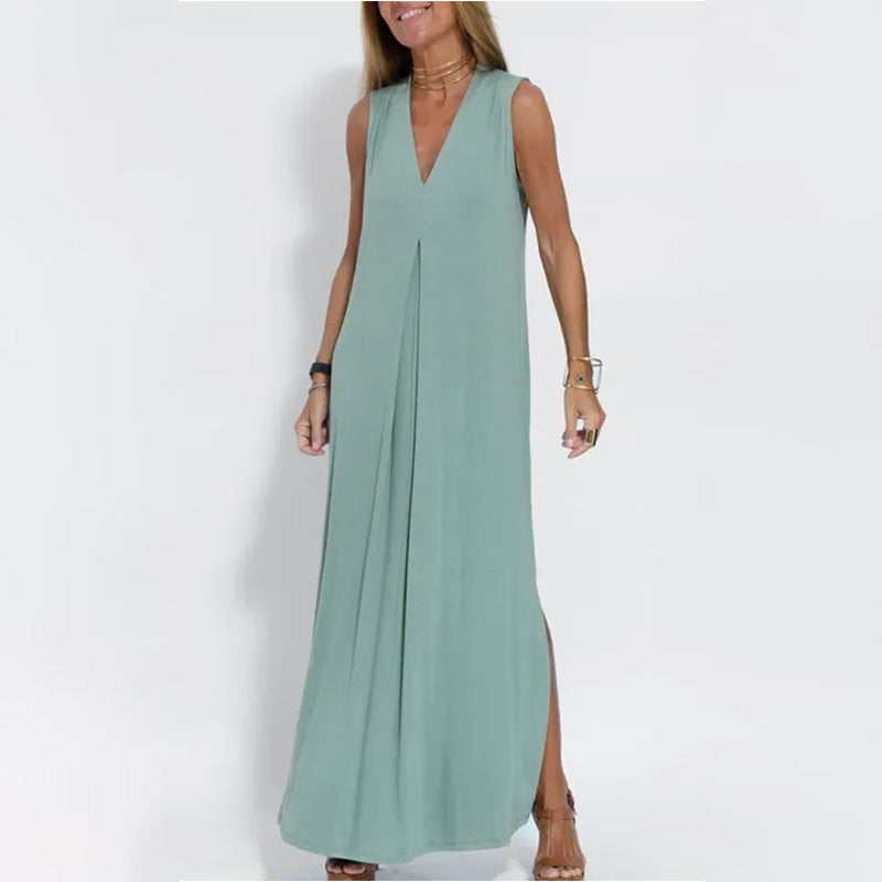 🔥👗Az ujjatlan, V-nyakú, laza szabású maxi ruha