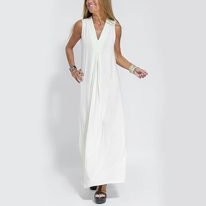 🔥👗Az ujjatlan, V-nyakú, laza szabású maxi ruha
