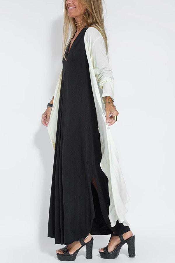 🔥👗Az ujjatlan, V-nyakú, laza szabású maxi ruha