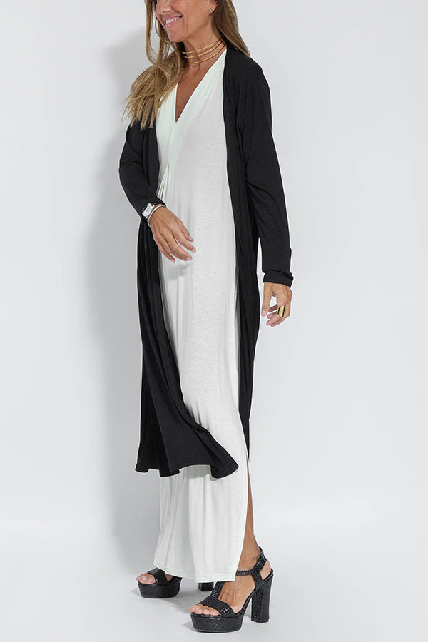 🔥👗Az ujjatlan, V-nyakú, laza szabású maxi ruha