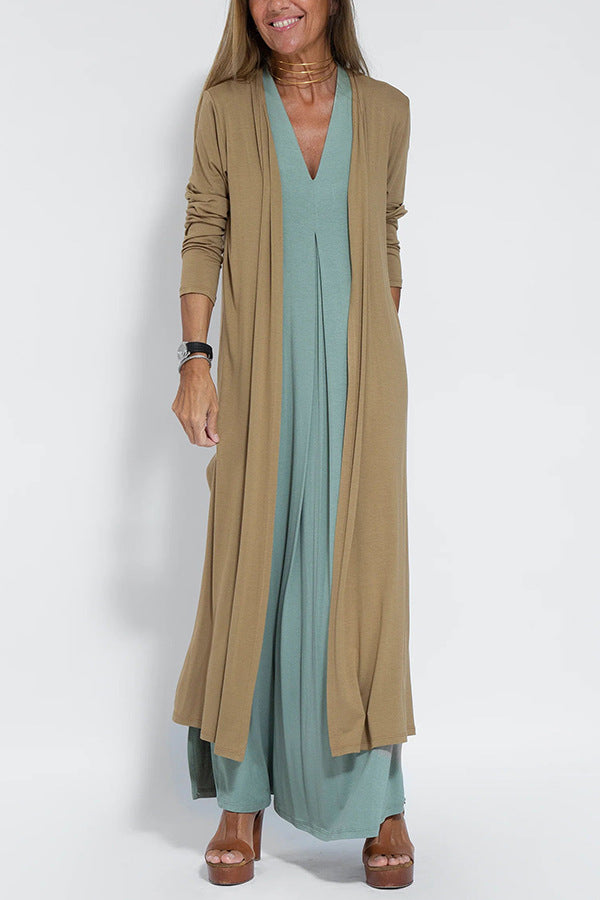 🔥👗Az ujjatlan, V-nyakú, laza szabású maxi ruha