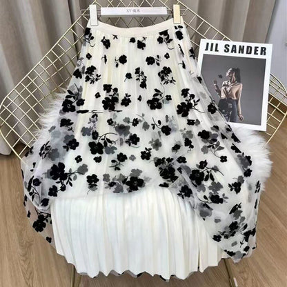 Virágos rakott midiszoknya A