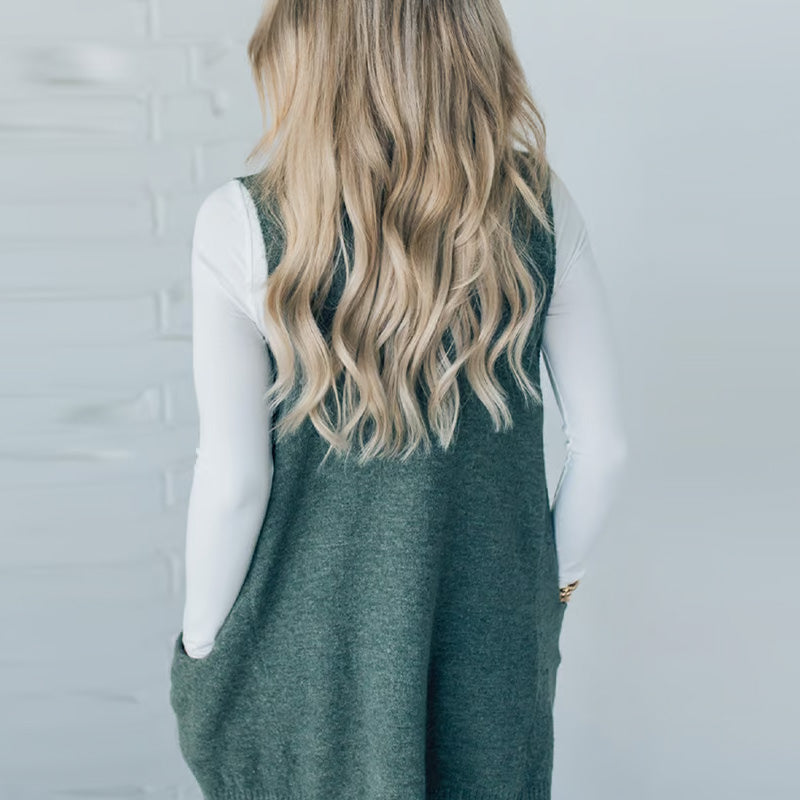 Női bő szabású pulóver V-nyakkal és zsebekkel