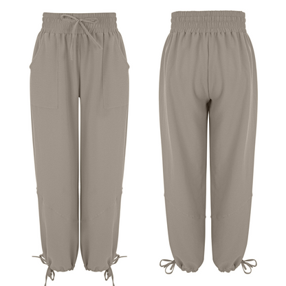 Női lezser, rugalmas, széles szárú nadrág zsebekkel