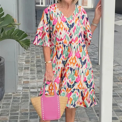 V-nyakú nyomtatott midi ruha