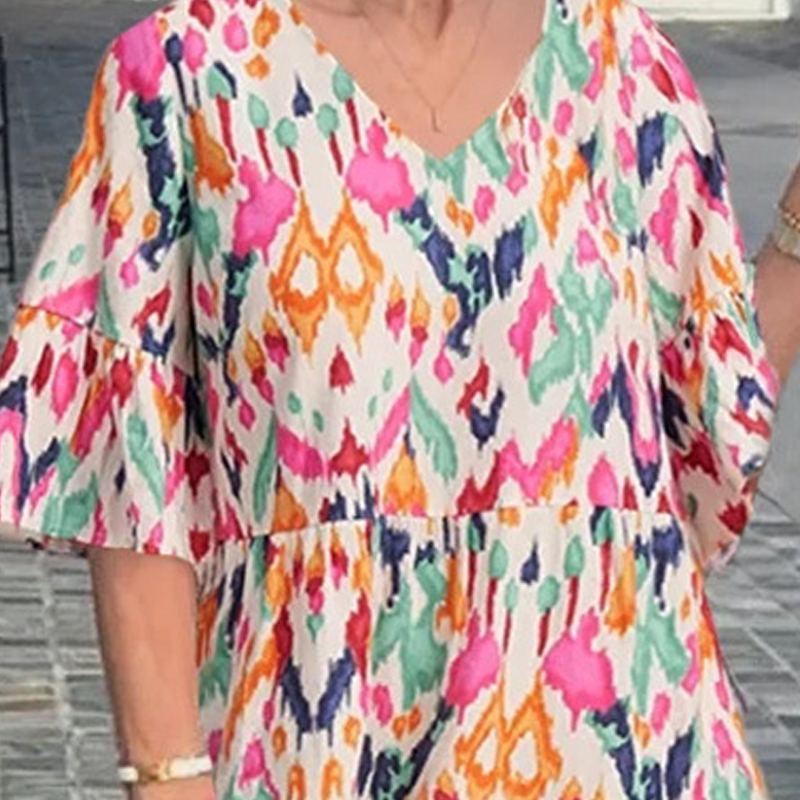 V-nyakú nyomtatott midi ruha