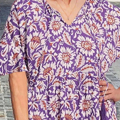 V-nyakú nyomtatott midi ruha