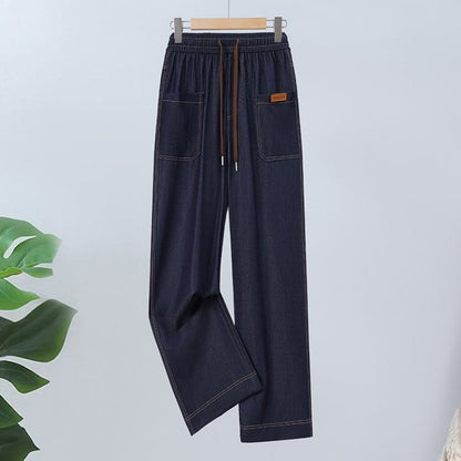 Húzózsinórral ellátott, magas derekú, egyenes szárú nadrág